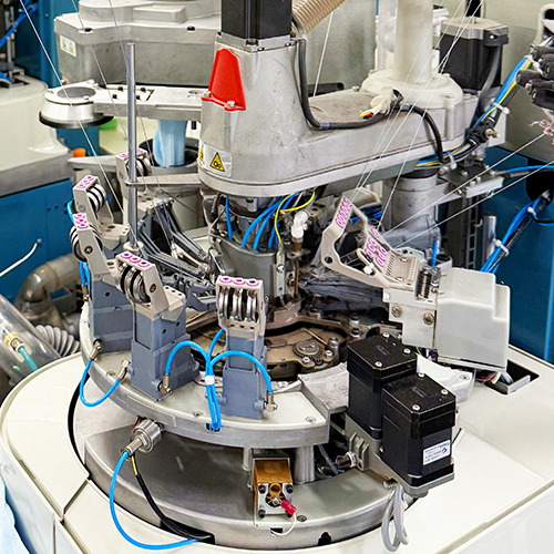 Sock knitting machine for custom sock production