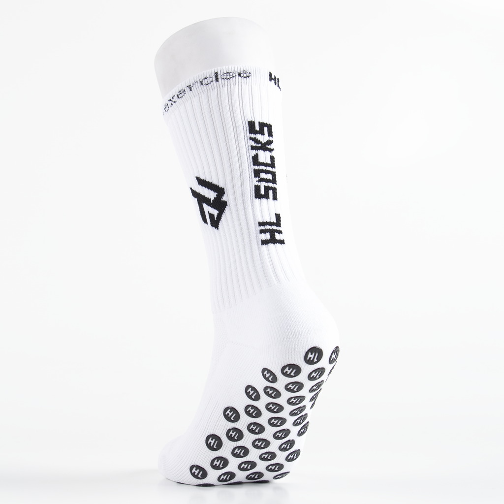 White custom grip sock sample with black grips